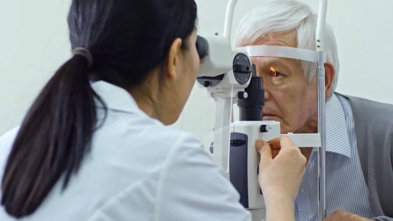 Optometrists conduct patient eye exams