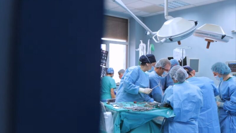 A Team of Surgeons Performing a Hernia Repair Surgery in A Well-Equipped Operating Room