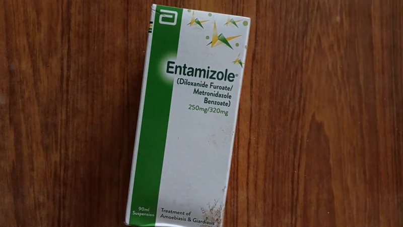 The Image Shows a Box of Entamizole, Which Contains Diloxanide Furoate and Metronidazole, Both Known for Their Antiprotozoal Activity in Treating Infections