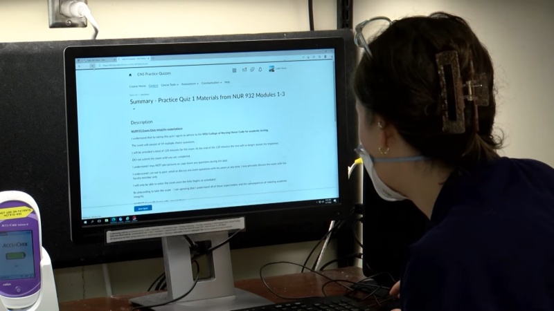 A Nurse Takes an Online Quiz for Her Nursing Degree Program